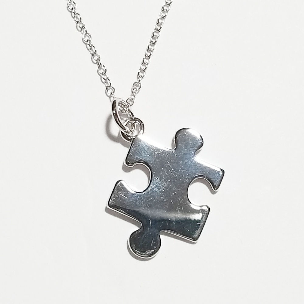 -Sterling Silver Puzzle Piece Necklace